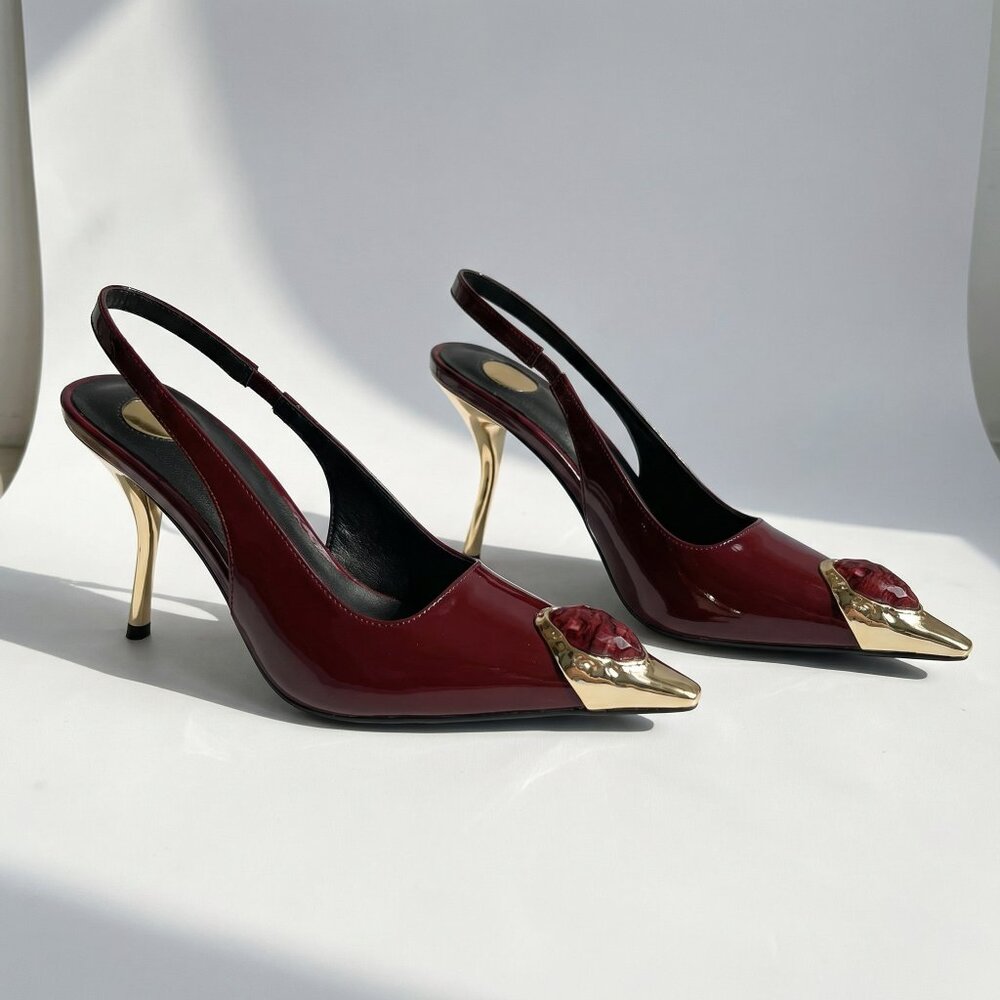 Patent leather slingback heels with gemstone tip embellishment